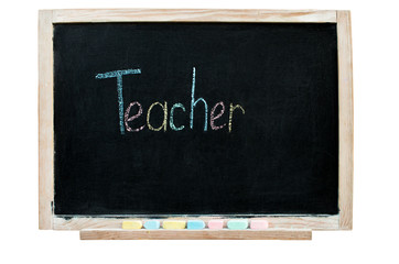 inscription in chalk on a blackboard - teacher, colored letters