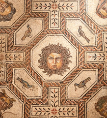 roman mosaic showing faces