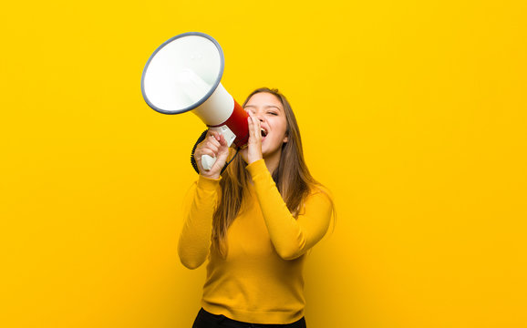 Young Pretty Woman With A Megaphone