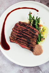 Wagyu Beef Flat Iron Steak with Truffle Vinaigrette and Vegetables 