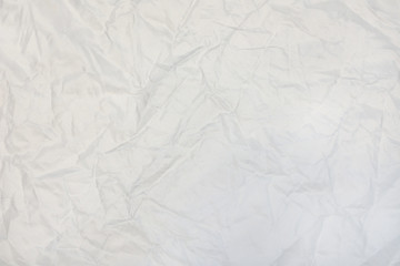 white crumpled background with fabric texture