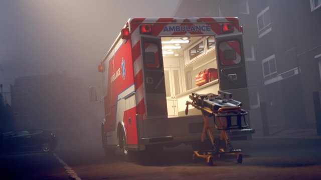 An empty ambulance with stretchers standing in the fog in the middle of the road