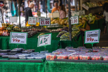A temporary public market in England, normally set up outdoors on certain days of the week, often,...