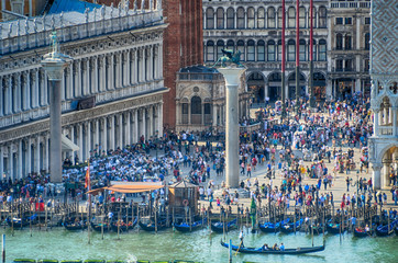 Crowd of tourists from all over the world on St. Mark's Square