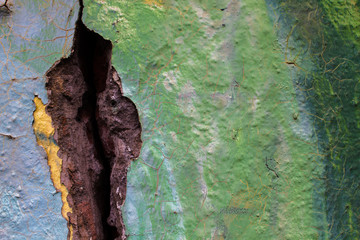 detail of a grungy vintage wall with graffiti