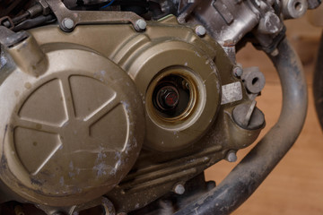 The process of diagnosing an engine on a motorcycle.