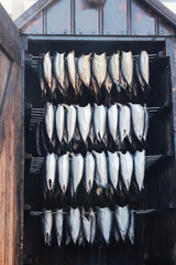 Fototapeta na wymiar Herring fish in a smokehouse