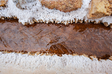 Salt terraces of Maras ( Salineras de Maras) in the Andes mountain range in the region of Cusco, Peru, Sacred Valley. One of the main tourist attractions in Cusco Region.