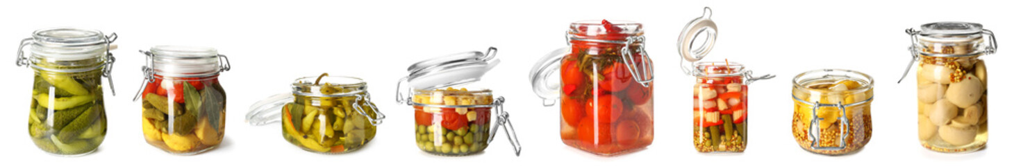 Jar with canned cucumbers on white background