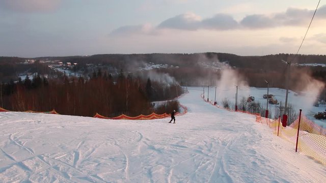 skier goes down the ski run