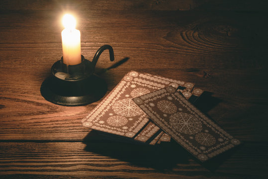 Tarot cards on the table of fortune teller concept.
