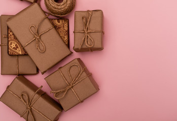 Gift boxes wrapping on pink background