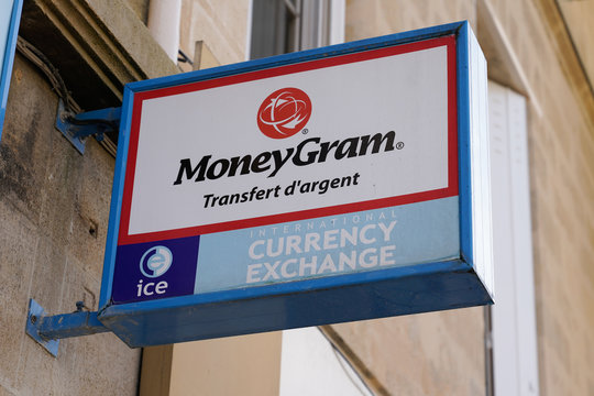 MoneyGram sign logo shop ice currency exchange international Money Transfers store service Online