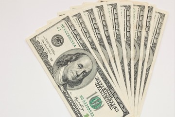 Texture of dollar bills. One hundred dollars. Close-up, macro.