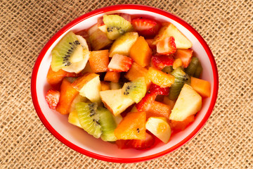 fruit salad in colorful bowls