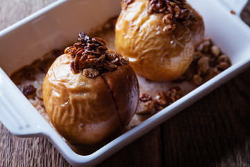 Vegan dessert, baked apples on rustic table