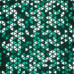 Abstract geometrical background with blur effect. Colorful illustration with small colored particles.