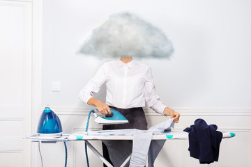 Woman ironing dress shirt with head of vapor cloud