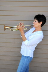 Female trumpet player.