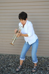 Female trumpet player.