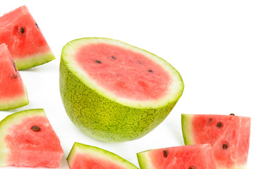 Ripe round watermelon and watermelons slices isolated on white background. Free space for text.