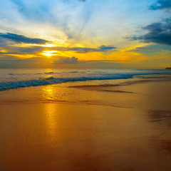 Fototapeta premium Beach of the sea and beautiful sunrise.