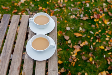 Cups with a coffee on table