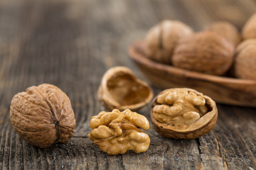 Handful of Walnuts on wooden background