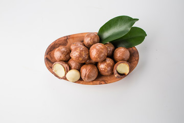 Organic macadamia nut on white background