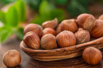 Close up of hazelnuts on wooden table