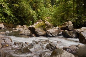 Naklejka na ściany i meble river La Fortuna, Arenal Volcano National Park, Costa Rica