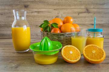 Fresh orange juice in the glass jar.