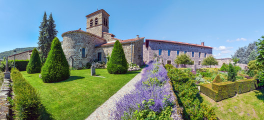 Panoramic view of Saint Victor church at left and the part of the castle from the garden. Saint Etienne metropole.