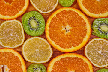 Citrus fruits arranged on the board, freshly cut - 304212379