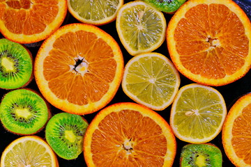 Citrus fruits arranged on the board, freshly cut - 304212386