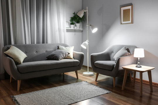 Stylish Interior Of Living Room At Night