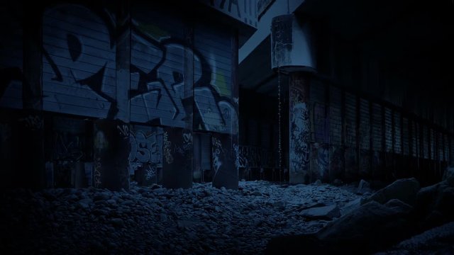 Moving Through Old Industrial Area With Graffiti In The Evening