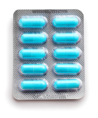 Blister pack with pills on white background