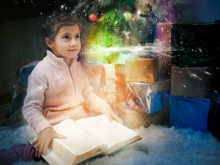 A girl reads. Concept-a fairy-tale world in a book for a child, children's imagination.