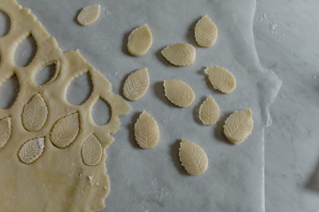 cutting cookies from dough