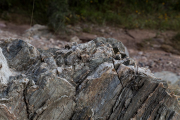granite rock, quartz and nickel streaks