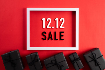 Online shopping of China, 12.12 singles day sale concept. Top view of white picture frame with...