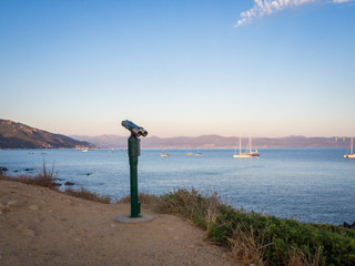 Coin-operated binoculars looking out over the seashore of Ajaccio - Corsica