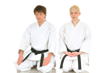 Obraz premium Young karate talented charming girl and young guy