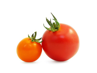 Big red and small yellow tomato with leaves isolated on white background