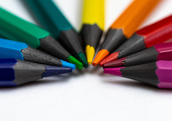 color pencils on a white background