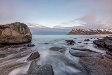Fototapeta na wymiar Beautiful rocks at Uttakleiv Beach, Lofoten Islands, Norway, Scandinavia, long exposure