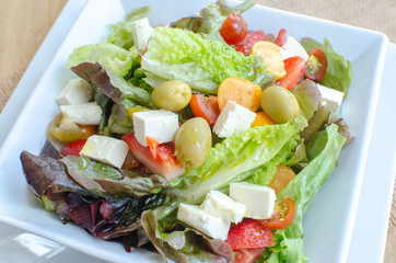  mixed salad with vegetables, cheese and fruits