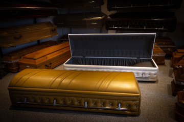 Gold Coffin with new modern like a Sofa chester style.