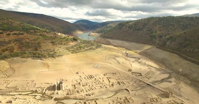 Flight with a drone over the dry reservoir of Mansilla in Soria, Spain.
